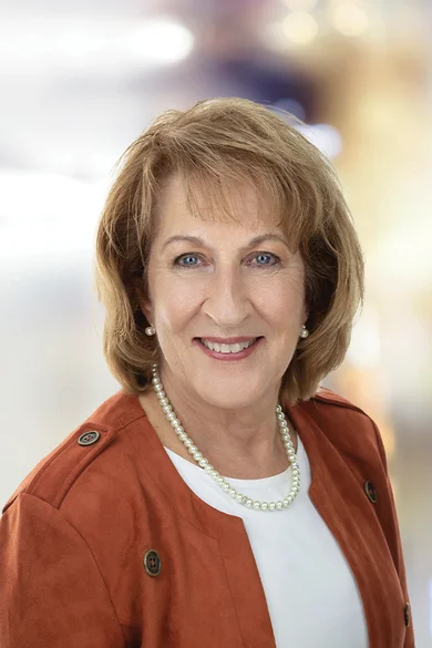 Portrait of Kathleen Sloan-Beard, REALTOR®.